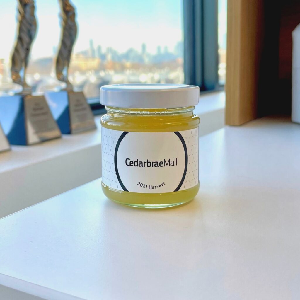 A jar of honey on a desk